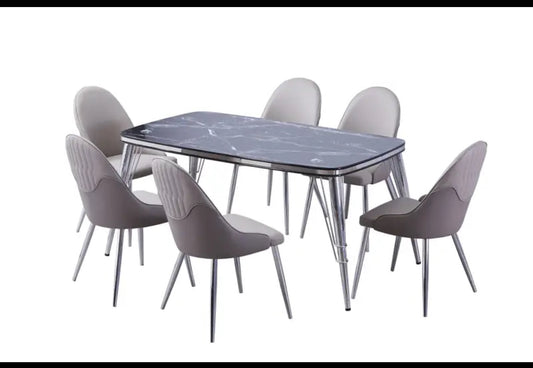 Luxe marble dining table with chairs