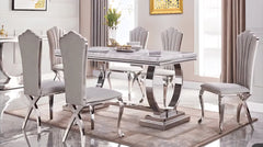 Bravia marble dining table with chairs combining sophistication and durable construction.
