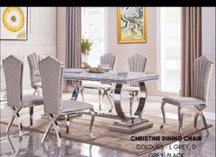 Bravia marble dining table with chairs combining sophistication and durable construction.