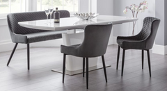 Sintered stone extendable dining table with six chairs for modern dining spaces.