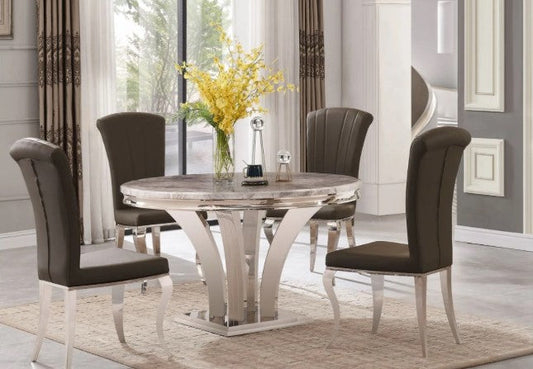Charisma round marble dining table with four chairs for contemporary dining rooms.